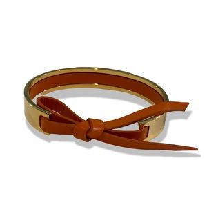 Gold Cuff Bracelet with Orange Leather Tie Strap